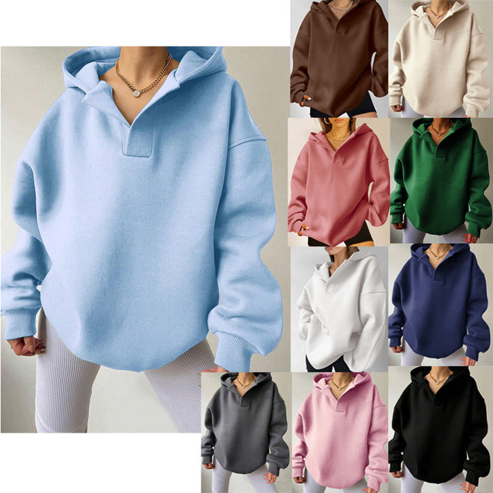Damen Oversize Kapuzenpullover mit V-Ausschnitt und Rippbündchen, perfekt für einen lässigen Herbst-Look.