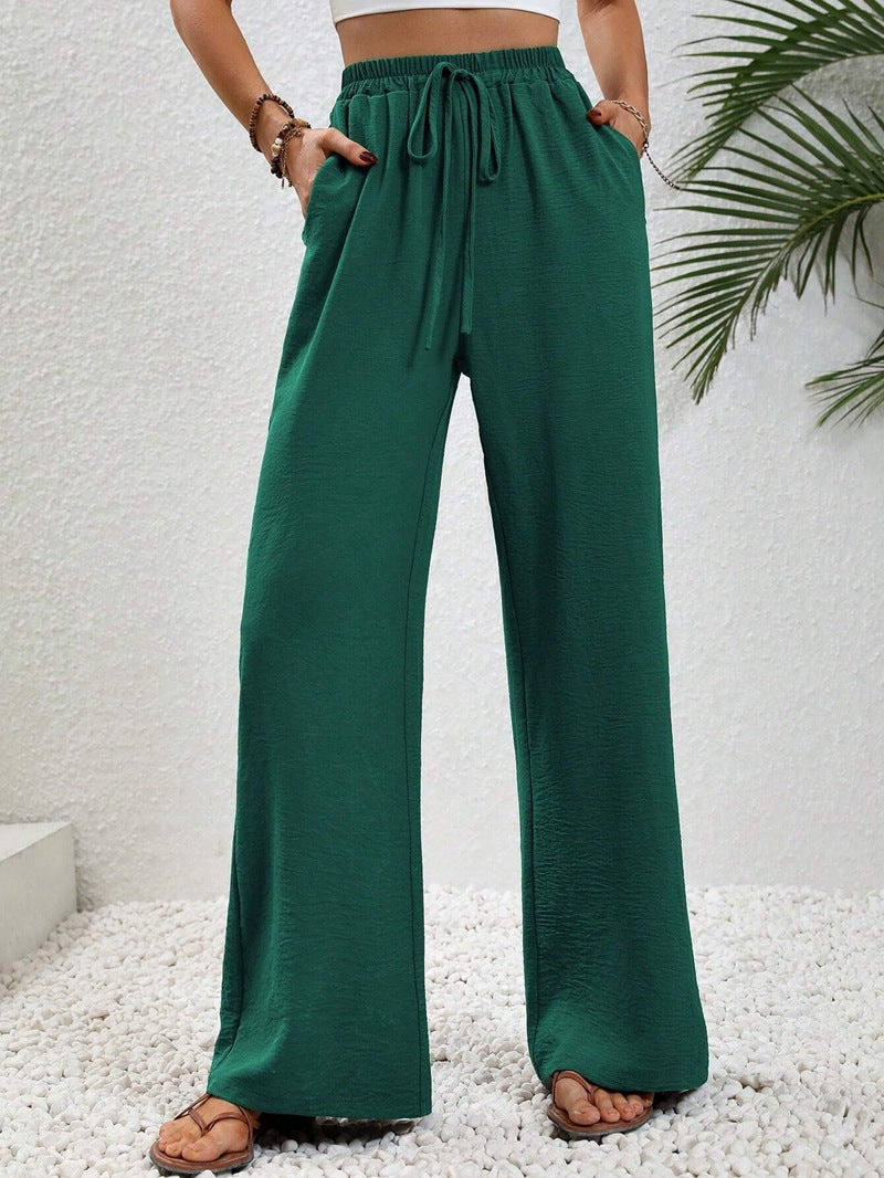 Modische Damenhose in Leinenoptik, weit geschnitten, mit Elastikbund für lässige Eleganz.