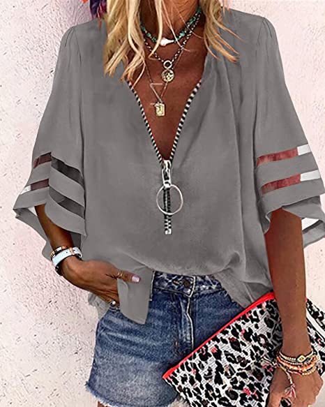 Trendige Damen Bluse: V-Ausschnitt, Ringreißverschluss, Cut-Out-Ärmel. Perfekt für Sommer & Freizeit.