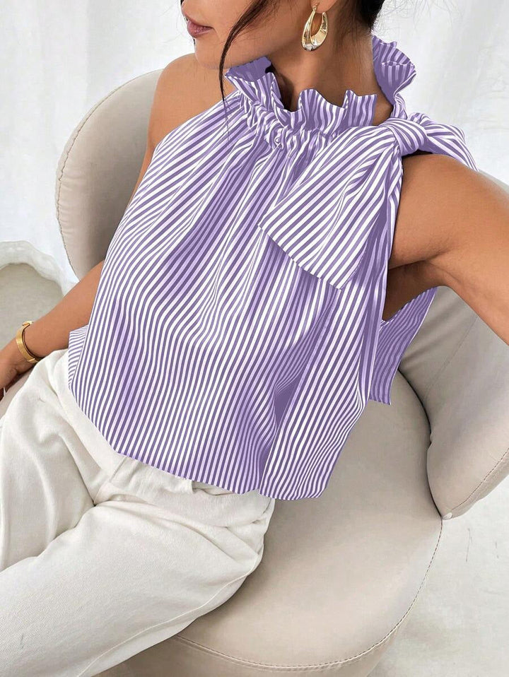 Feminine Sommerbluse ärmellos mit Stehkragen und Schulterschleife. Ideal für Freizeit und Komfort.