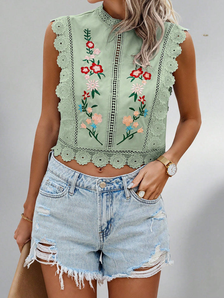 Kurzes Damen Cropped Top mit aufwendiger Stickerei, Stehkragen & Häkeldetails, ideal für den Sommer-Urlaub.