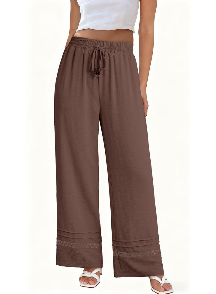 Weite Damenhose im Sommer-Look, hoher Bund, Bindekordel, femininer Spitzensaum. Ideal für Freizeit.