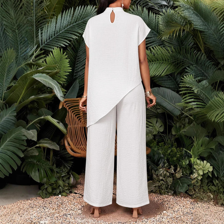 Stilvolles Damen Outfit: Locker geschnittene asymmetrische Tunika & weite Palazzo-Hosen im bequemen Zweiteiler Set.