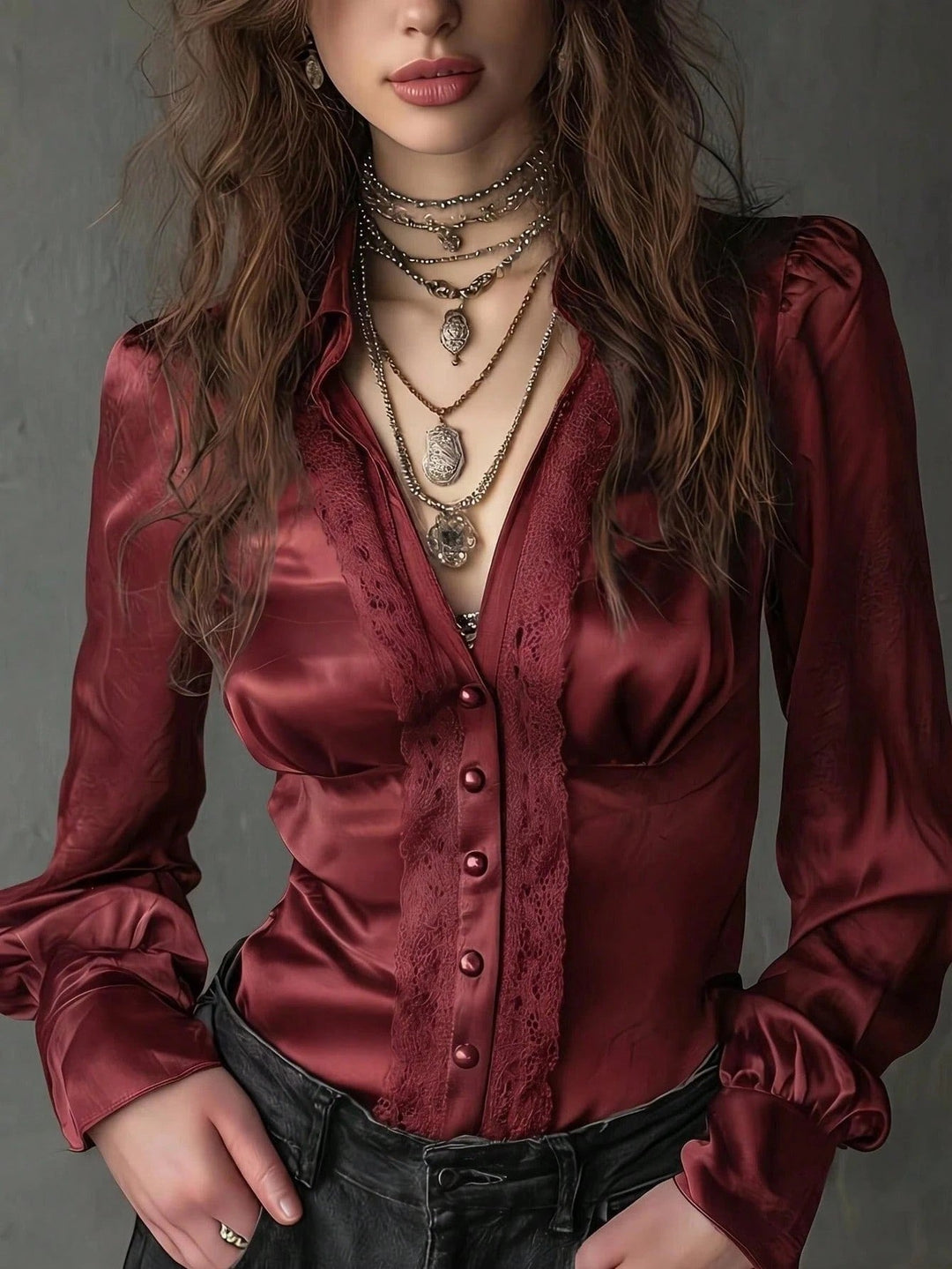 Hochwertige Damenmode: Taillierte Bluse mit Puffärmeln, eleganter Knopfleiste und modernem Schnitt.