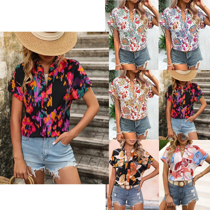 Leichte Damen Tunika-Bluse mit lebhaftem Blumenprint und lässigem Oversize-Schnitt, ideal für Freizeit & Urlaub.