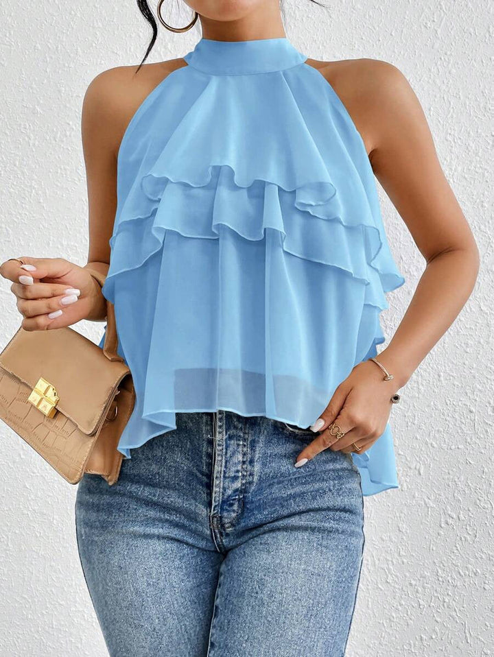 Feminines, luftiges Damen Cocktail-Top mit elegantem Stehkragen und charmanten Volants, ärmellos und chic.