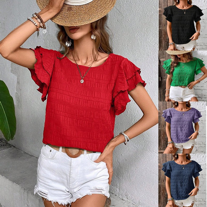 Elegante Damen Kurzarm-Bluse mit Smok und femininen Volantärmeln, perfekt für Sommer und Büro.