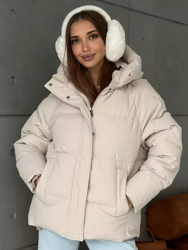 Beige Oversized Damen Winterjacke, bequem, warm, trendig, ideal für kalte Tage.
