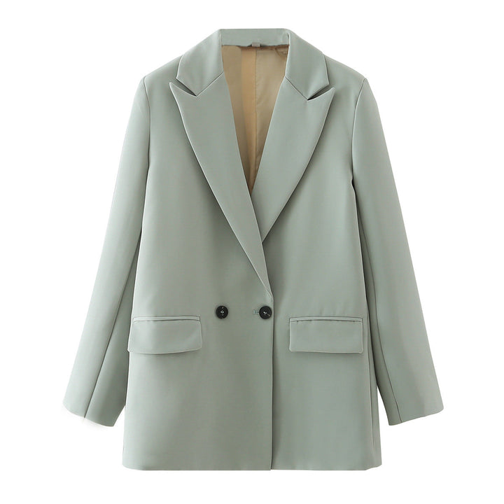 Eleganter Oversize Damenblazer mit Doppelreiher-Knöpfen, perfekt für einen professionellen Büro-Auftritt.