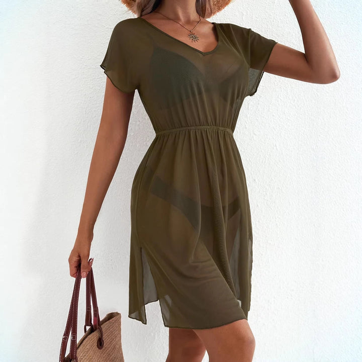 Modernes Damen Strandkleid in A-Linie mit V-Ausschnitt, Kurzarm & dezentem Blätterprint für sommerliche Eleganz.