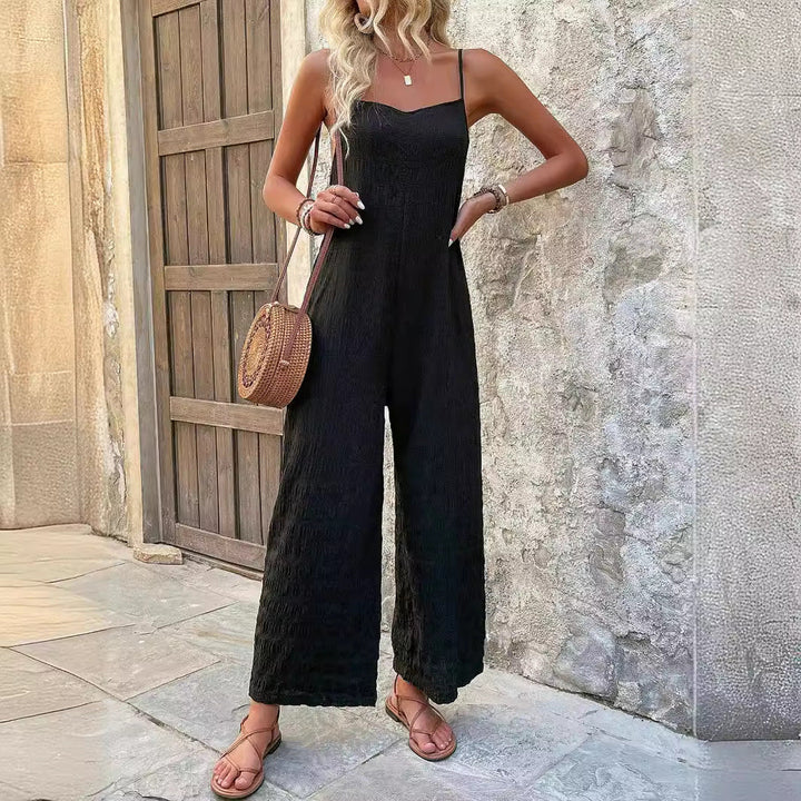 Ärmelloser Damen Sommer Jumpsuit mit auffälligem Paisley-Print & bequemem weitem Bein. Ideal für warme Tage.