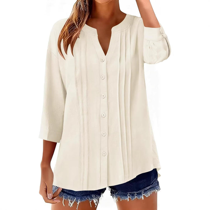 Lockeres Damen Tunika Shirt mit eleganten Kellerfalten & Dreiviertelärmeln. Ideal für Freizeit & Frühling.