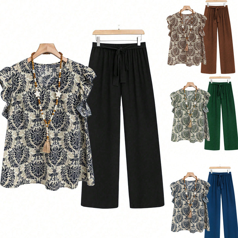 Eleganter Damen Zweiteiler: florale Printbluse mit Rüschen & bequeme weite Hose. Stilvoll für Frühling & Sommer.