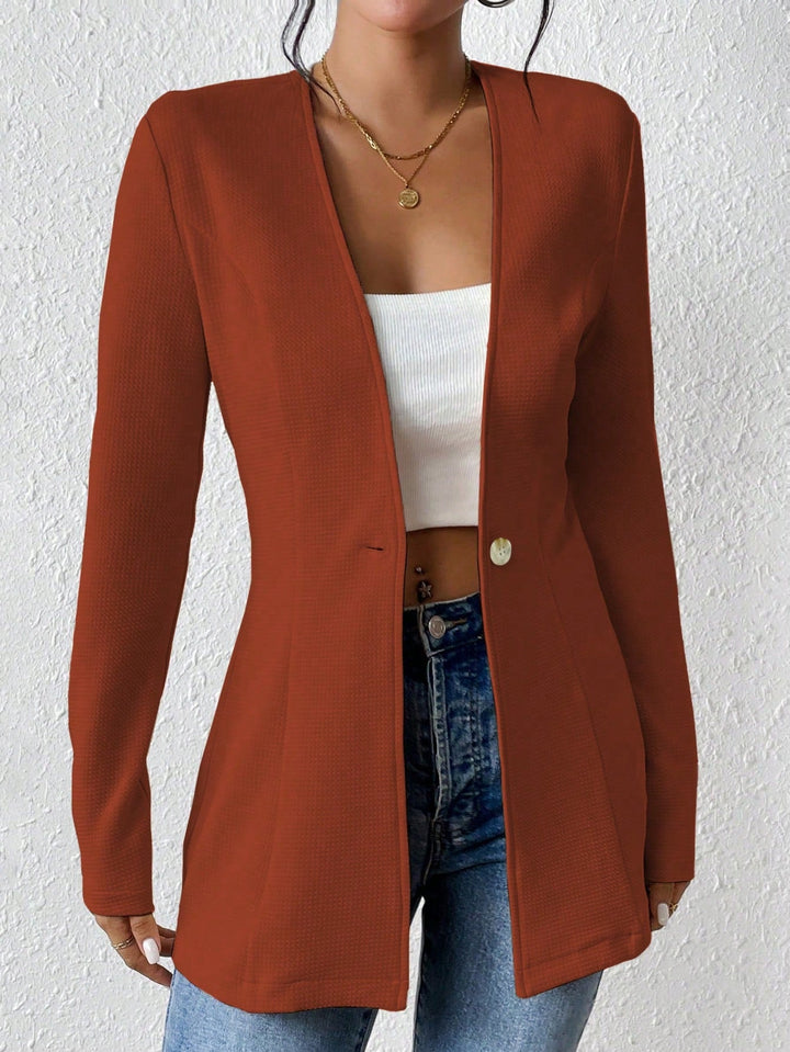 Zeitloser Damen Longblazer, tailliert und elegant, eine vielseitige Ergänzung für jede Garderobe.