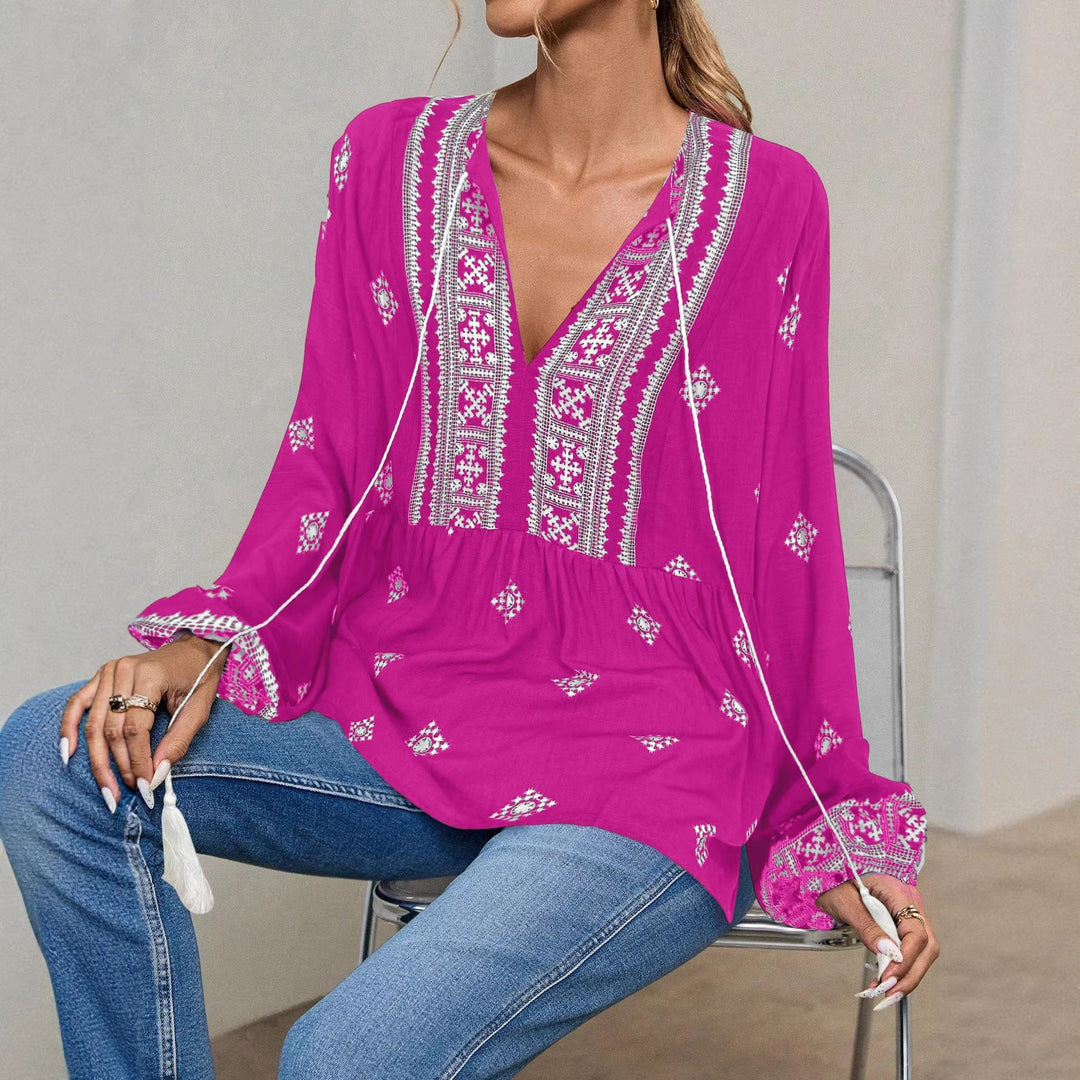 Sommerliche Damen Tunika Bluse, bestickt, mit lässigem Schnitt, Quasten und modischem Stufensaum.