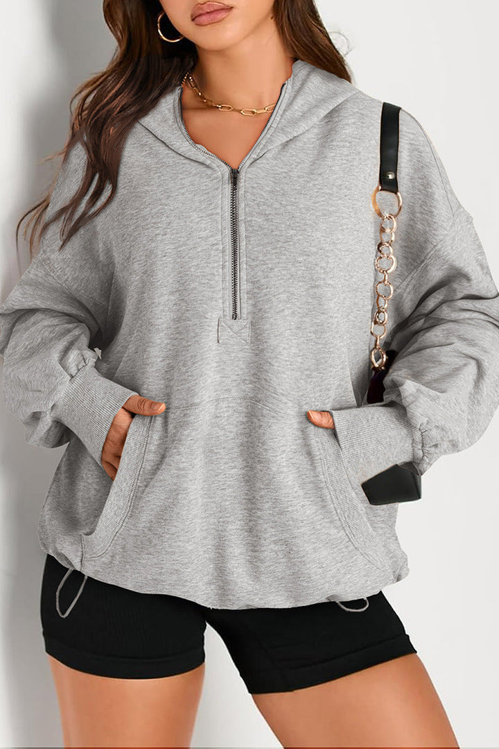 Trendiger Damen Oversize-Halbzip-Hoodie mit weicher Kapuze, Tunnelzug & geräumiger Kängurutasche.