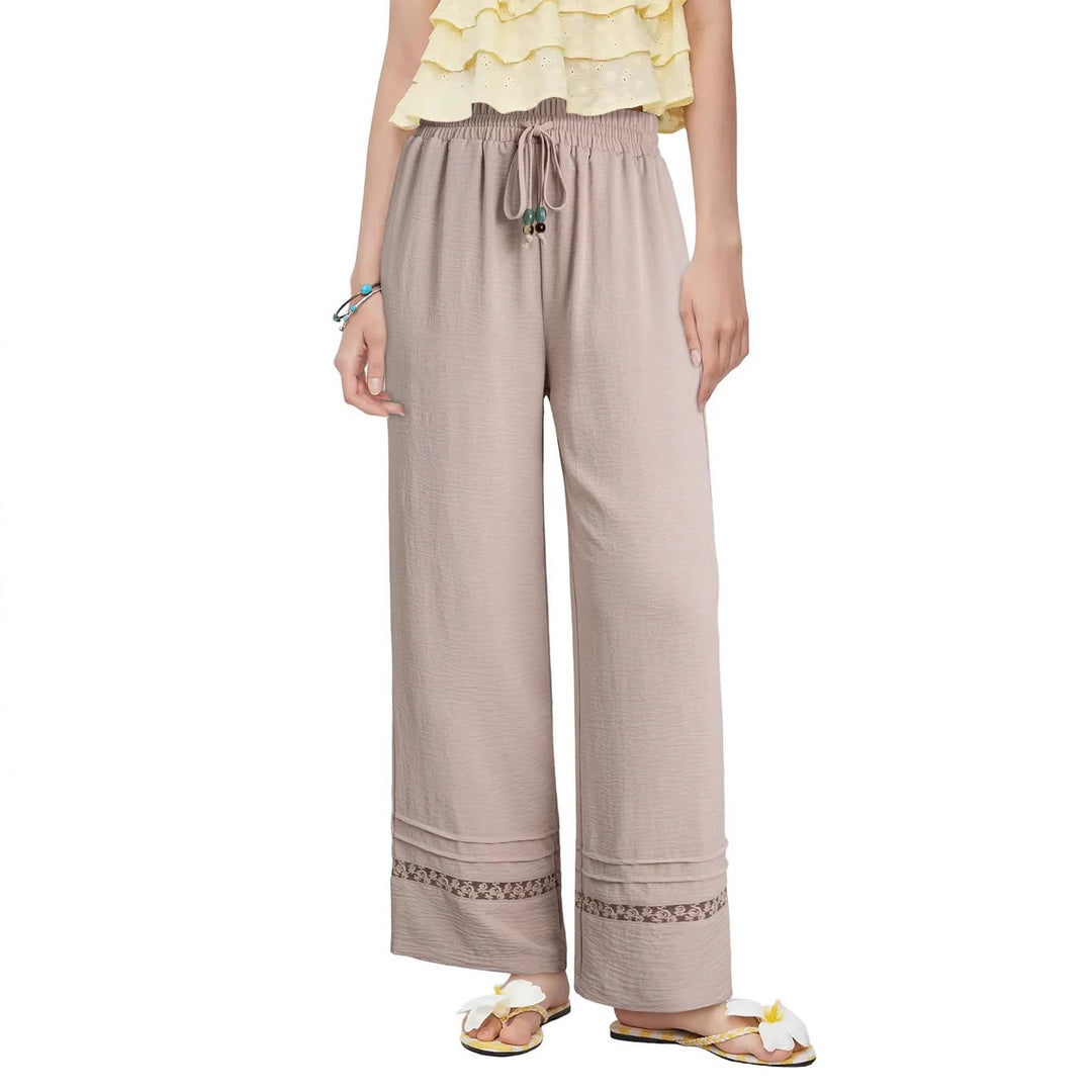 Damen Sommerhose mit hohem Bund, Bindekordel, weitem Bein und elegantem Spitzensaum. Bequem & stylisch.