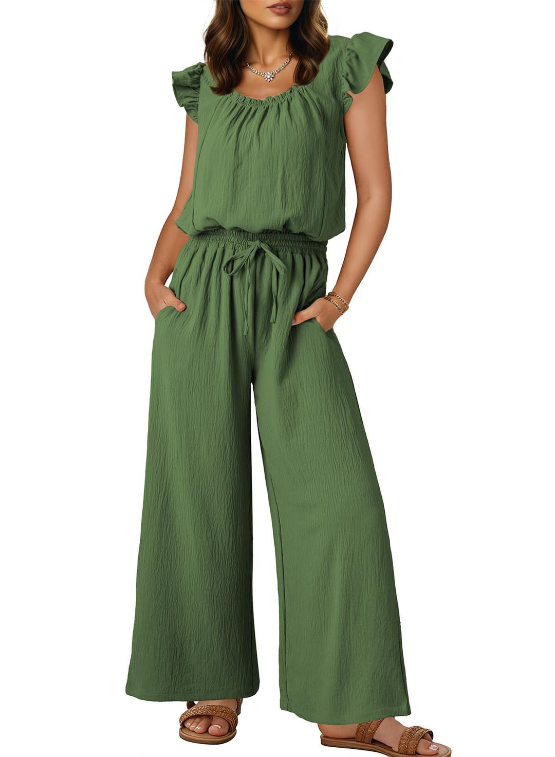 Entspannter Damen Crinkle-Jumpsuit, locker geschnitten mit weitem Bein & Rüschen, ideal für den Urlaub.