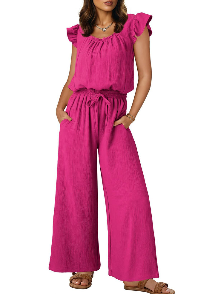 Damen Crinkle-Jumpsuit in Schwarz, weites Bein, Rüschenärmel, kombiniert Eleganz & Komfort perfekt.