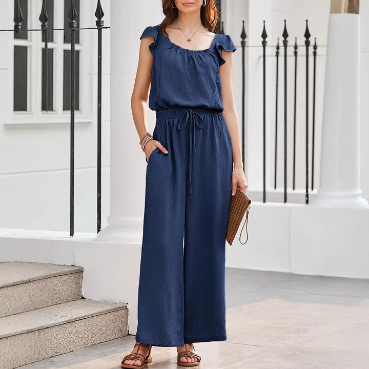 Komfortabler Damen Crinkle-Jumpsuit mit weitem Bein, fließend & luftig, ideal für Freizeit & Urlaub.