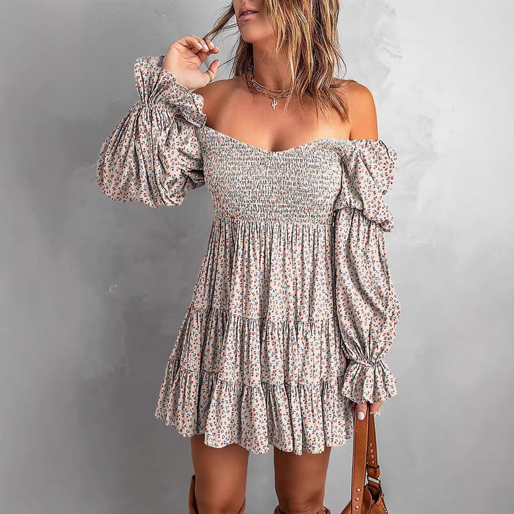 Elegantes Damen Minikleid off-shoulder mit Blumenmuster. Ideal als Freizeit-, Strand- oder Festivalmode.
