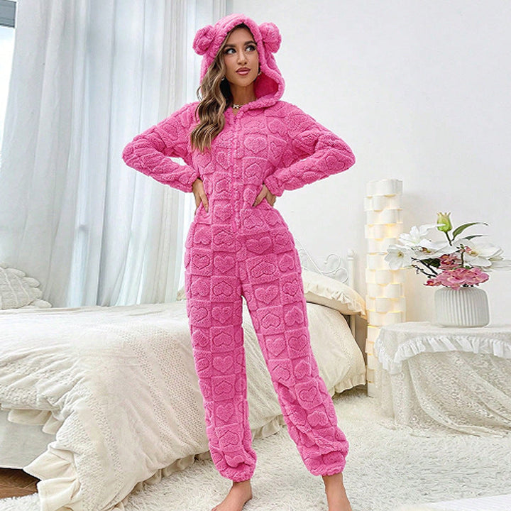 Damen Kapuzenoverall aus weichem Fleece, komfortabler Homewear für kalte Tage.