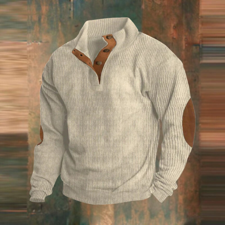 Eleganter Herrenpullover aus Rippstrick mit stilvoller Knopfleiste am Kragen. Zeitloses Design für Männer.