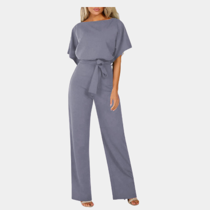 Eleganter Damen Jumpsuit mit weitem Bein und Taillengürtel, ideal für Abendgarderobe.