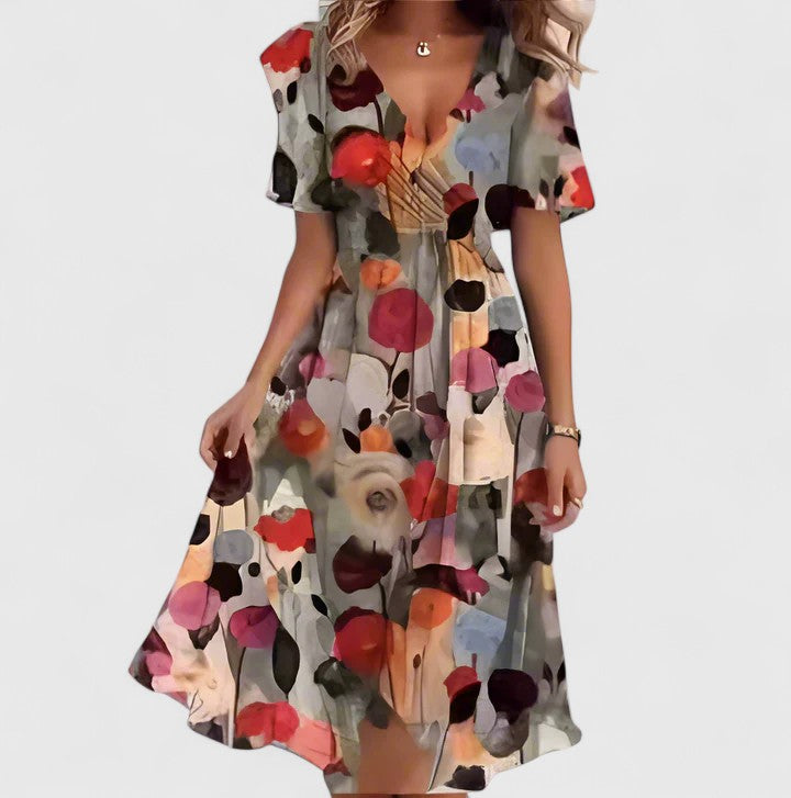 Luftiges Damen Sommerkleid im Slim Fit, mit wunderschönem floralen Muster. Ein bequemes und elegantes Freizeitkleid.