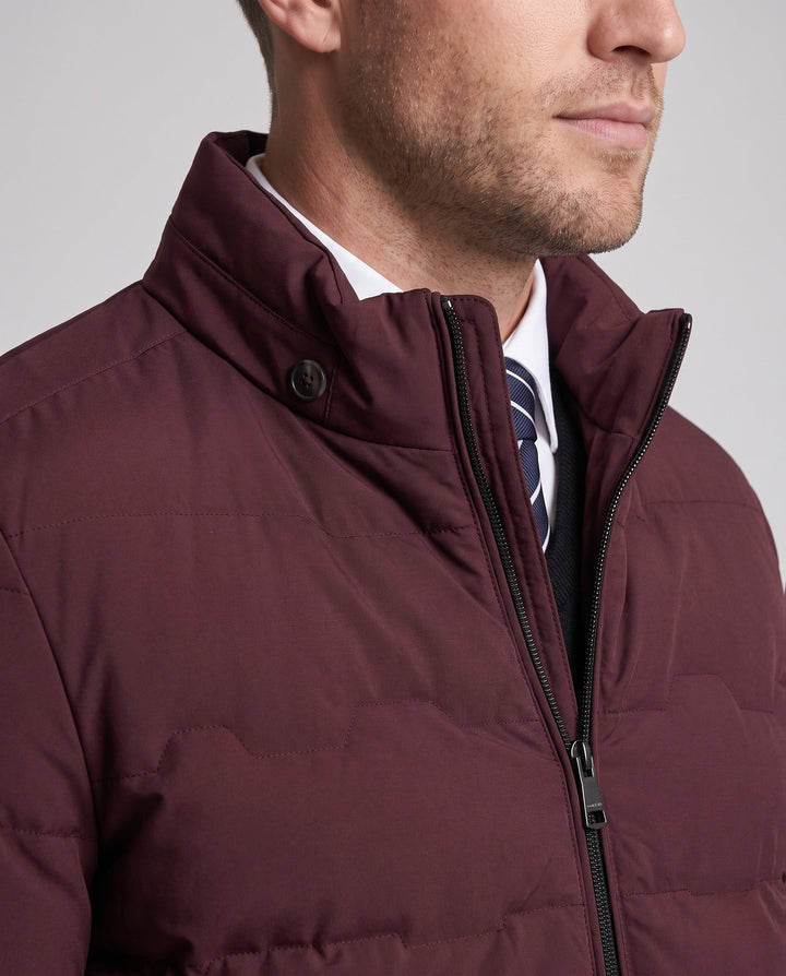 Warme, gesteppte Thermojacke für Herren. Leichte, taillierte Winterjacke mit Stehkragen. Perfekt für kalte Tage.