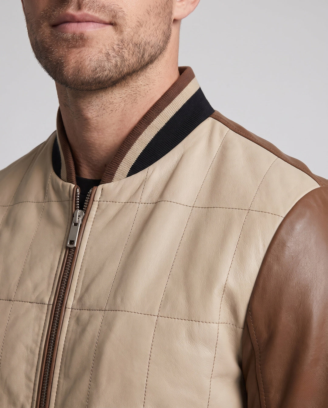 Stilvolle Herren Übergangsjacke, zweifarbig, gesteppt, mit Reißverschluss & geripptem Kragen für urbane Männermode.