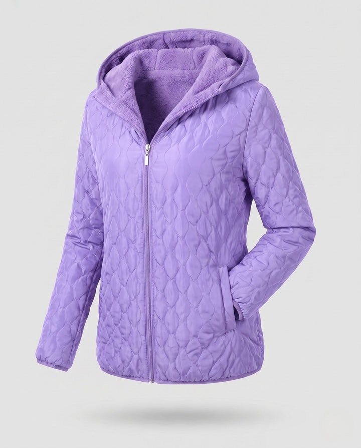 Stylische Damen Steppjacke, mittellang, wattiert, mit Kapuze. Modische Übergangsjacke für Frauen.
