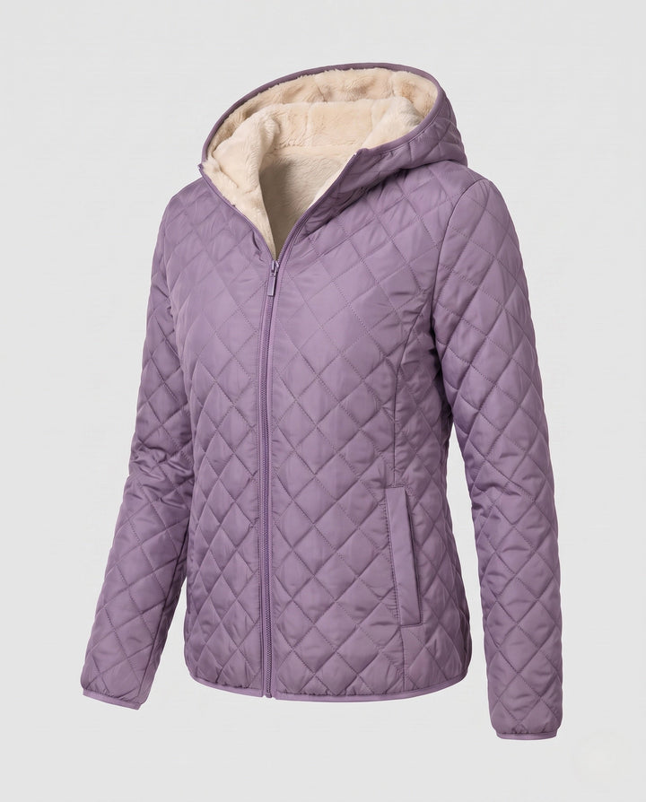 Vielseitige Damen Steppjacke mit Kapuze. Geeignet als Freizeitjacke, Outdoorjacke oder leichte Winterjacke.