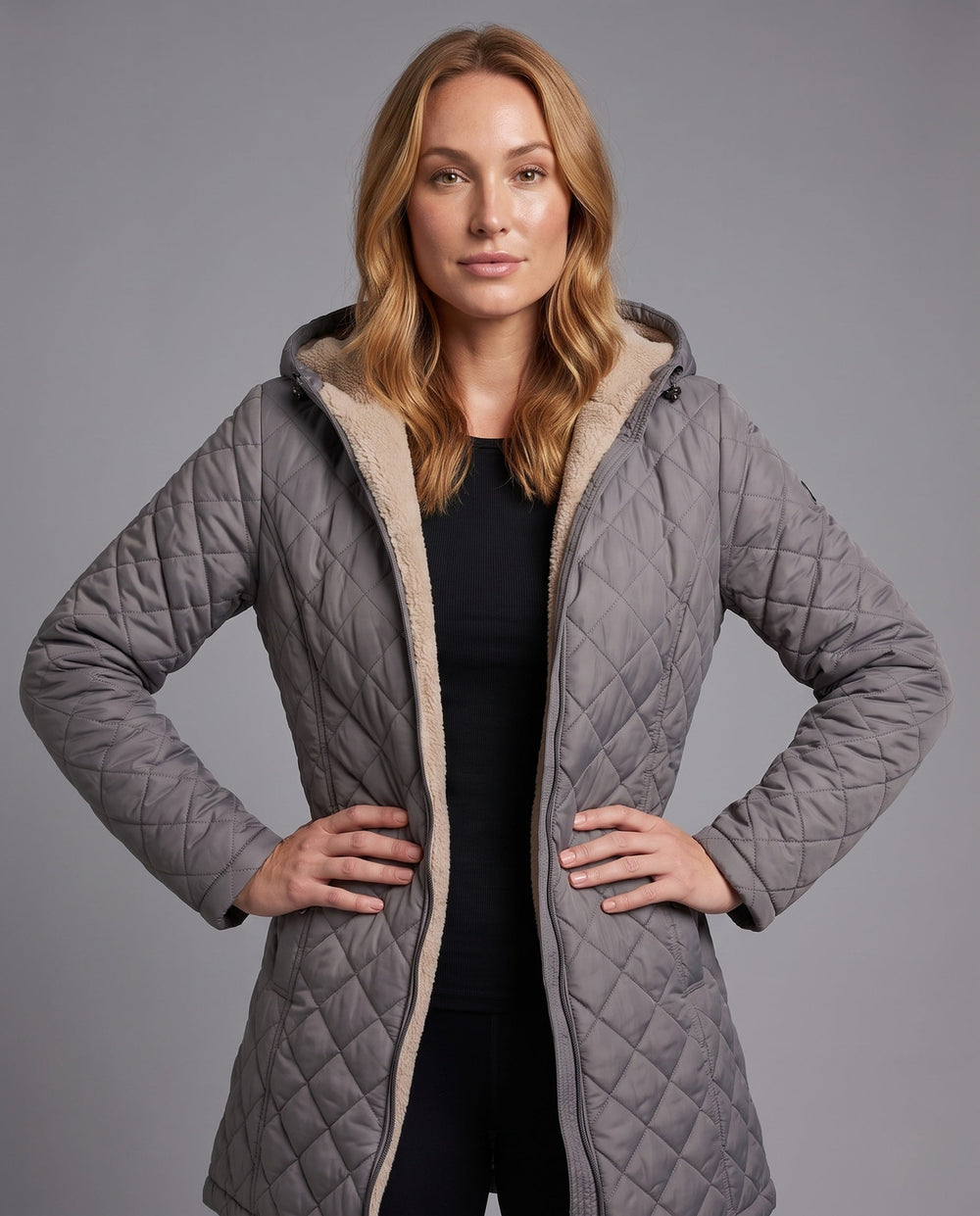 Eleganter Damen Steppmantel mit Kapuze, warm und bequem, perfekt für kalte Tage.