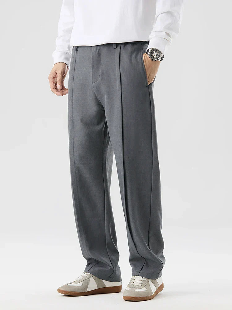 Vielseitige graue Herren Bundfaltenhose mit elastischem Bund, ideal für stilvolle Business-Looks.