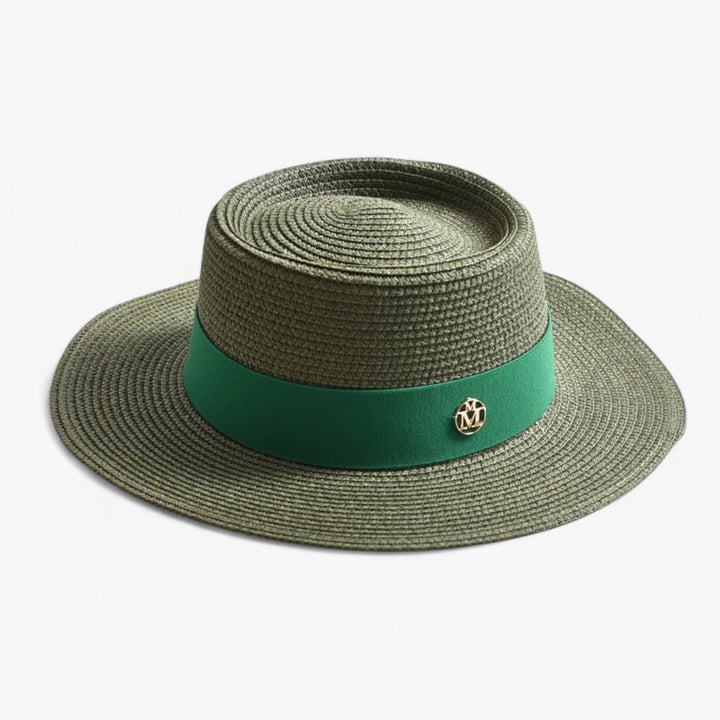 Schicker Strohhut für Damen mit breiter, schützender Krempe und natürlichem Look fürs Geflecht.