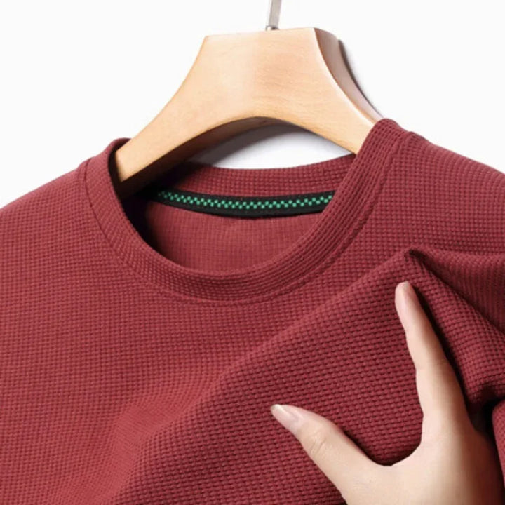 Herren T-Shirt, Kurzarm, mit atmungsaktiver Waffelstruktur und Rundhalsausschnitt.