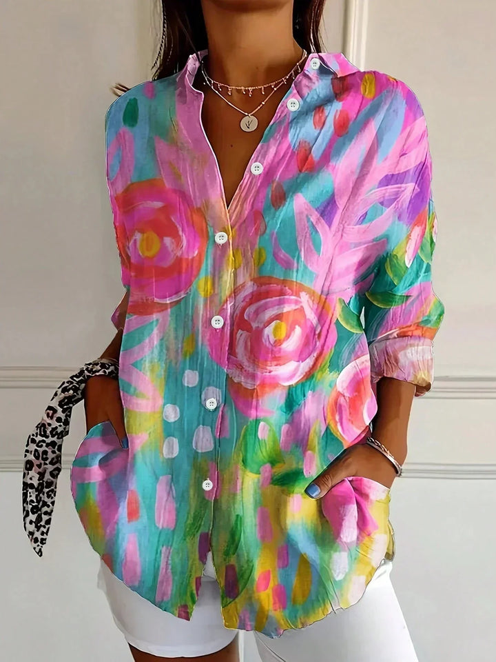 Elegante Damen Bluse mit lebhaften, bunten Mustern, locker geschnitten für Sommer & Frühling. Bequem.