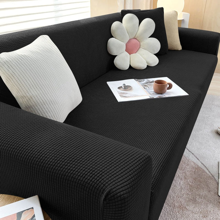 Robuste Schutzhülle für Sofa in Dunkelblau. Strapazierfähiger Möbelschutz, pflegeleicht & dehnbar.