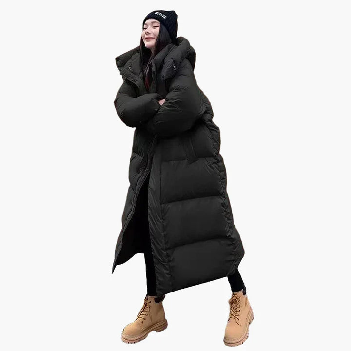 Eleganter, warmer Damen Puffer-Kapuzenmantel in Übergröße. Ideal für kalte Wintertage und Outdoor-Aktivitäten.