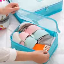 Vielseitige Packwürfel & Aufbewahrungstaschen für Reisen; halten Kleidung & Accessoires geordnet.