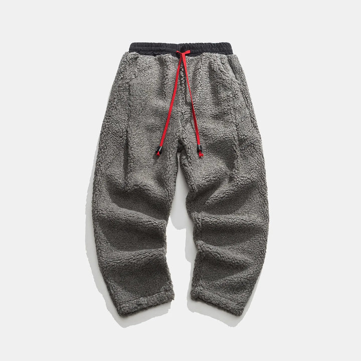 Moderne Herren-Sweathose mit Kordelzug und weicher Innenseite. Bietet stilvollen Komfort für Freizeit.