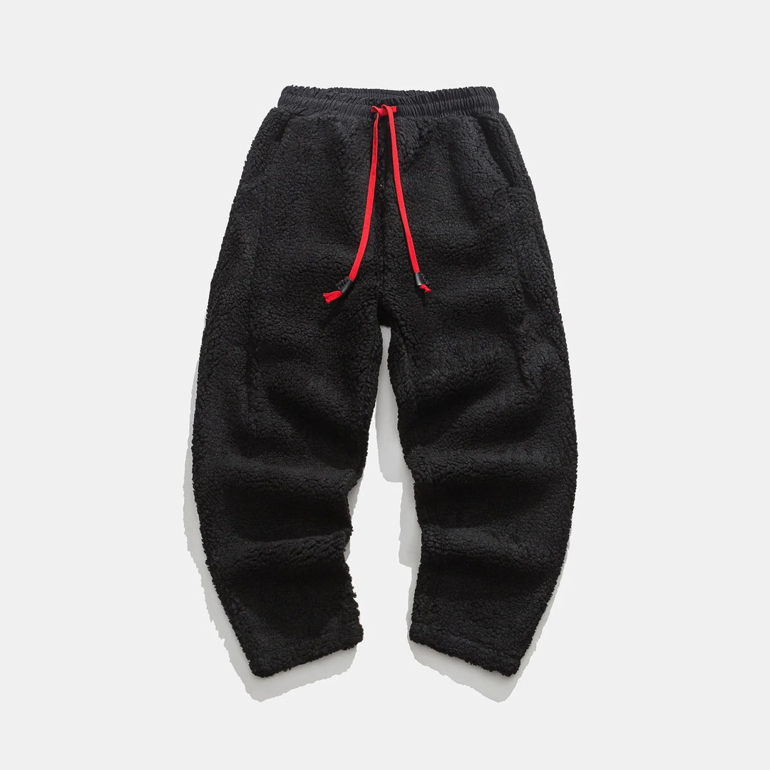 Warme Herren-Jogginghose, locker geschnitten. Perfekt für Winter-Komfort & entspannte Stunden zu Hause.