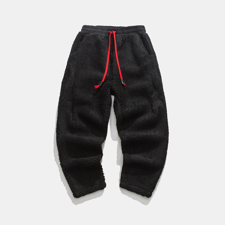 Warme Herren-Jogginghose, locker geschnitten. Perfekt für Winter-Komfort & entspannte Stunden zu Hause.
