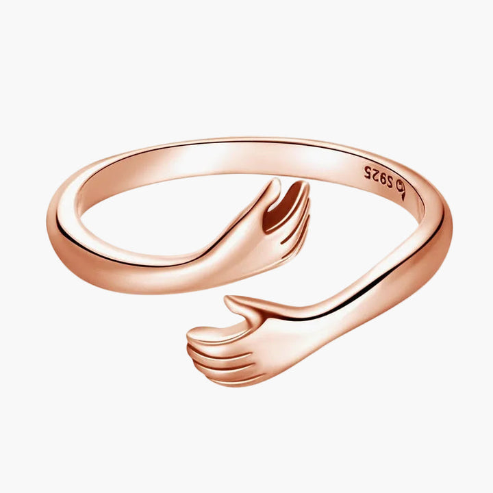 Bedeutungsvoller Gold Damen Umarmungsring, Geschenkidee für Frauen, symbolisiert Verbundenheit & Freundschaft.