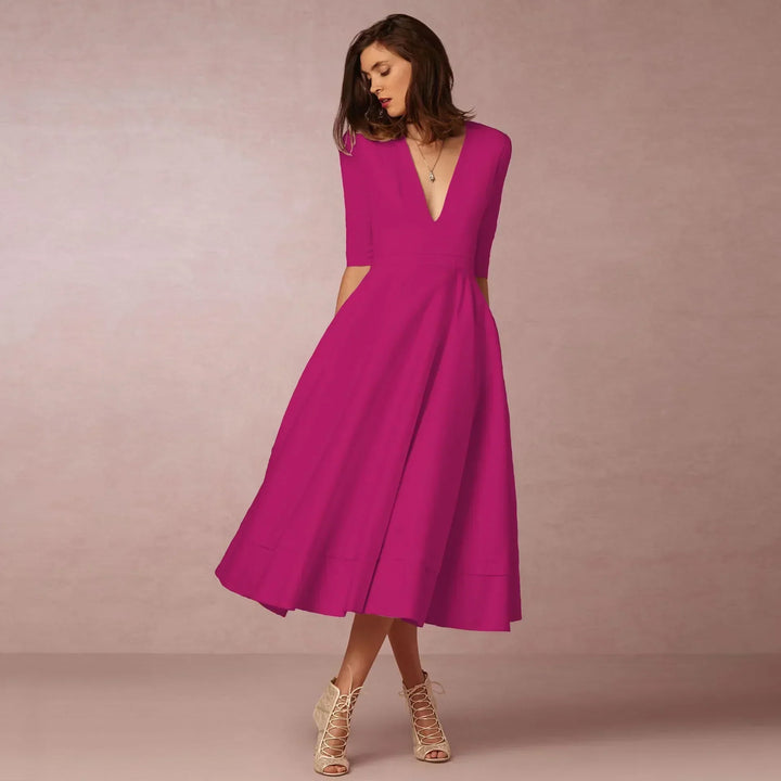 Vielseitiges Damen Midikleid, elegant und fließend, tragbar als Sommer-, Freizeit- oder Partykleid.