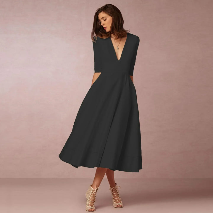 Feminines, elegantes Damen Midikleid mit fließendem Schnitt, ideal für festliche Anlässe und besondere Auftritte.