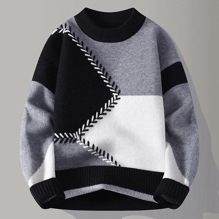 Hochwertiger Herren-Winterpullover mit auffälligem geometrischem Color-Blocking-Muster & Rippsaum.