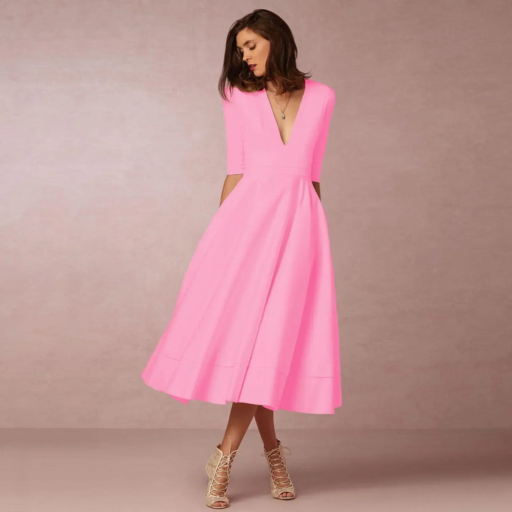Anmutiges, elegantes Damen Midikleid mit fließender Silhouette, perfekt für festliche Veranstaltungen und elegante Auftritte.