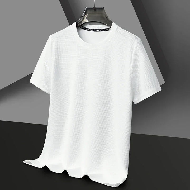 Atmungsaktives Herren T-Shirt mit Mesh-Waffelstruktur, perfekt für heiße Tage.